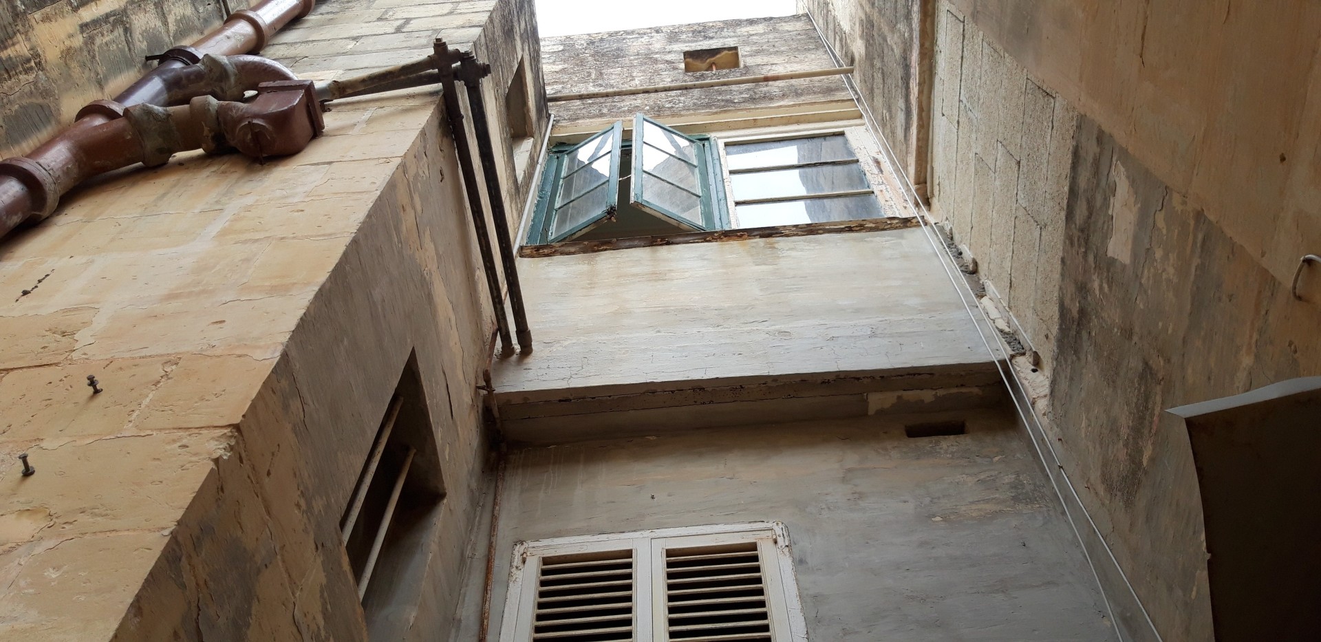 Malta real estate:Corner house for sale with three shops in Rabat